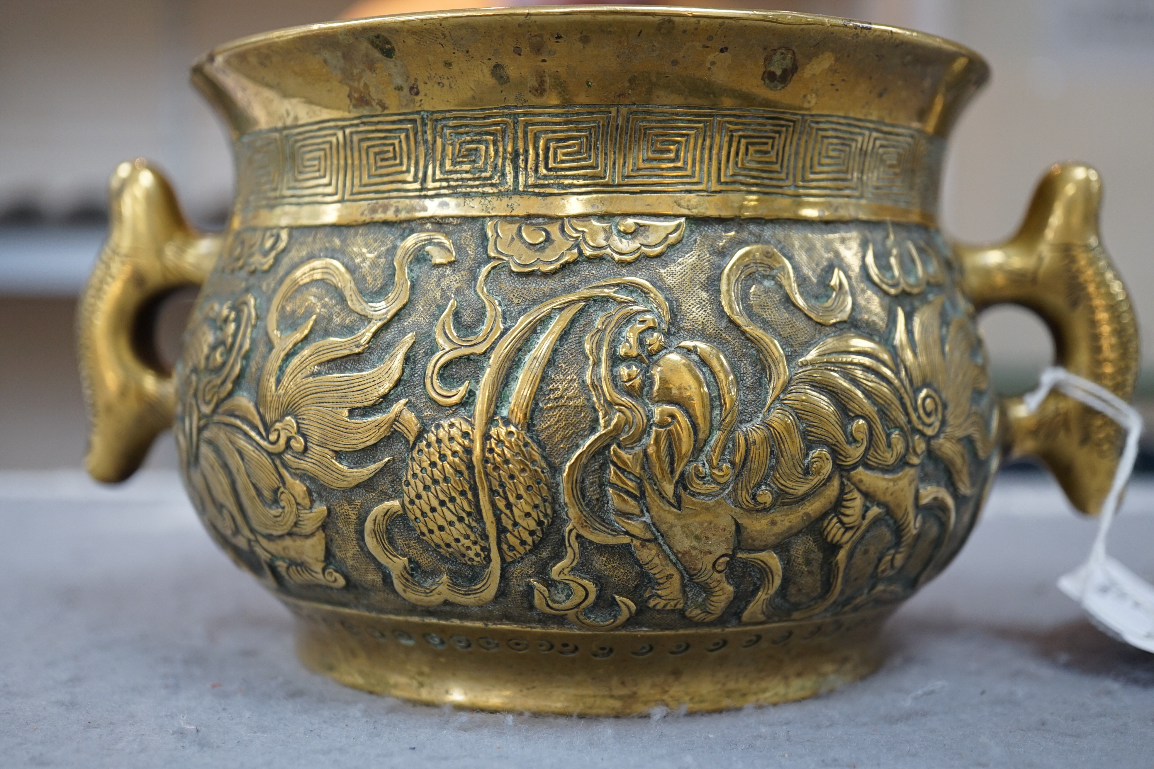A Chinese polished bronze ‘Buddhist lion’ censer, gui, 19th century, 19.5cm wide, rim diameter 14cm